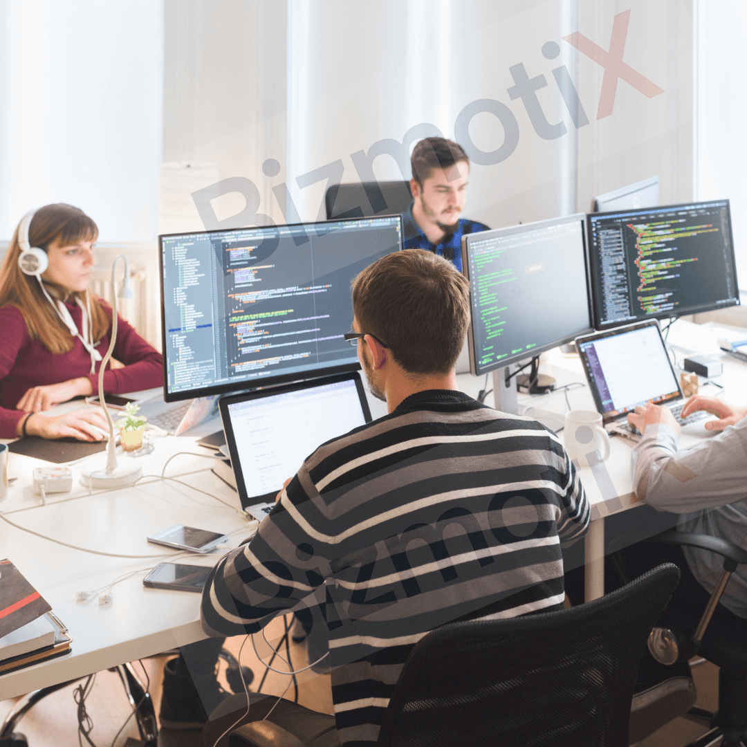BizmotiX web development and SaaS team collaborating on a project